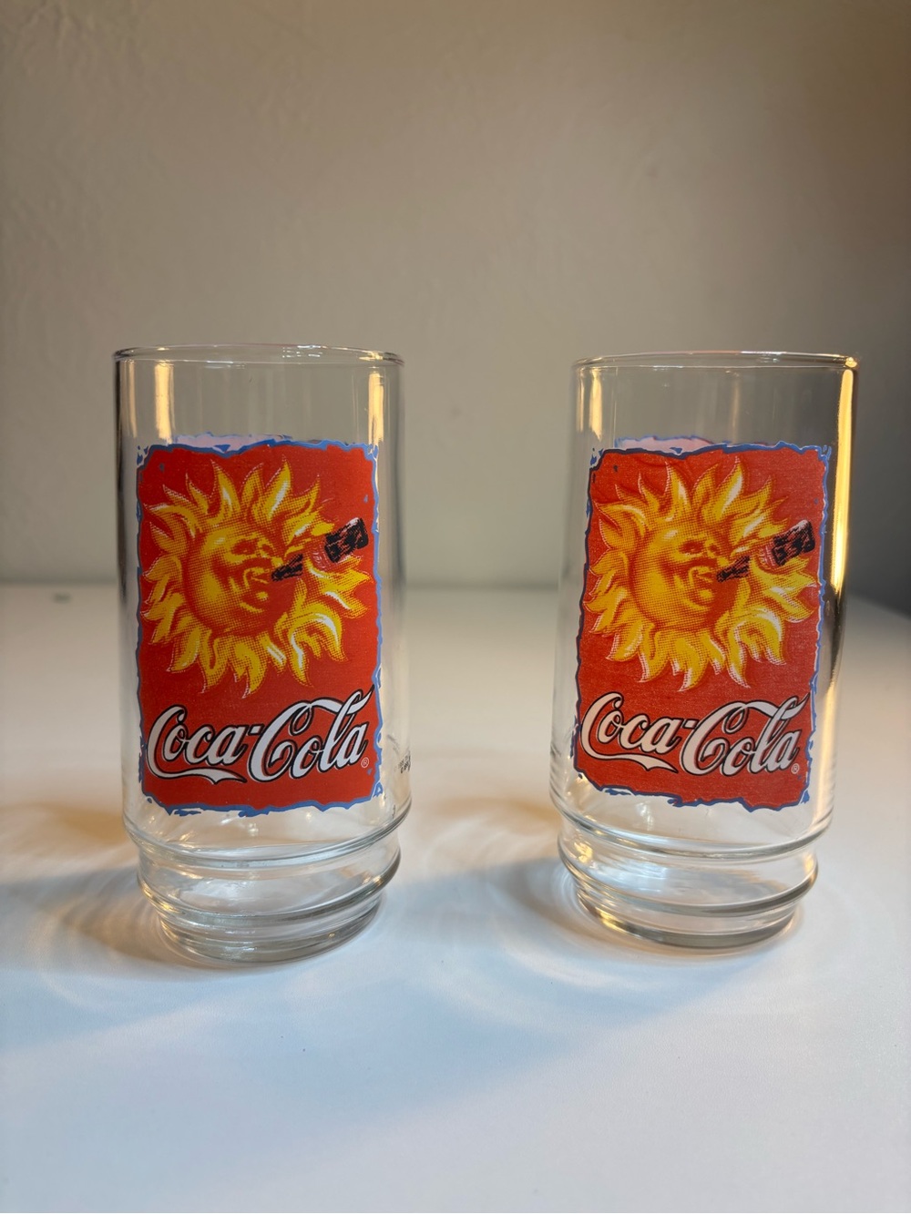 Coca Cola Red Glasses with Yellow Sunburst Design - Pair